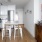 a kitchen with white cabinets