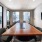 a room with a table and chairs