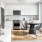 a kitchen with white cabinets