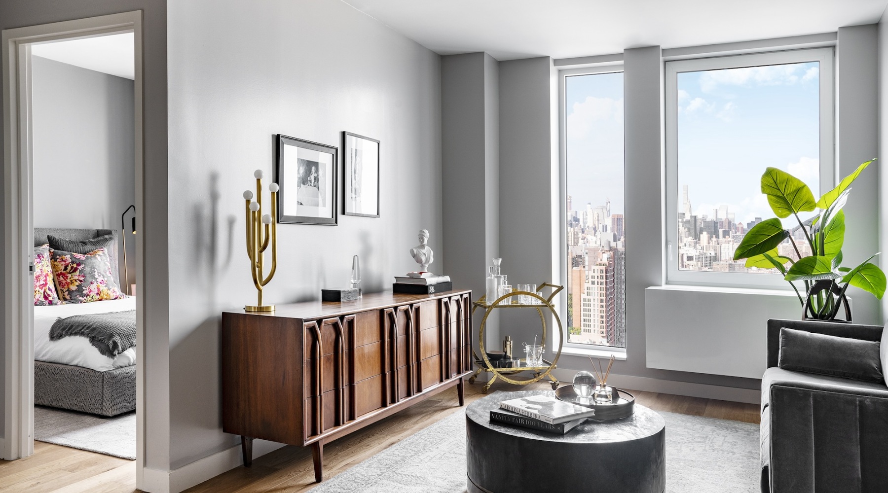 living room with a large window and open spaces